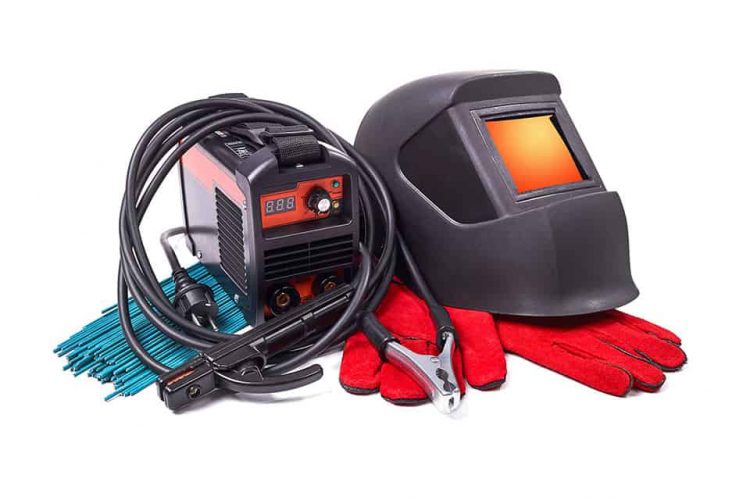Inverter welding machine, welding equipment, isolated on a white background, welding mask, leather gloves, welding electrodes, high-voltage wires with clips, set of accessories for arc welding.